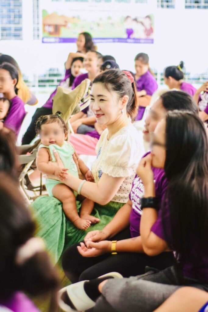 Nikki Tang with the residents of Haven for Women